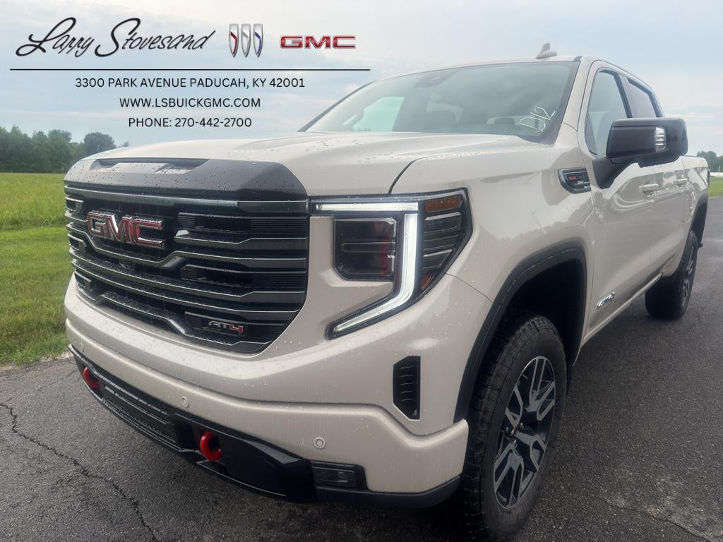 2026 GMC Sierra 1500 AT4 in Coastal Dune — front three-quarter view