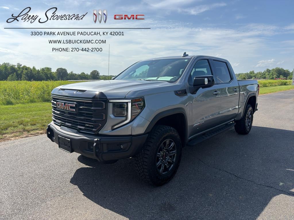 2024 GMC Sierra 1500 AT4X in Sterling Metallic — front three-quarter view
