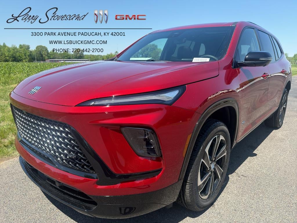 2026 Buick Enclave Sport Touring in Cherry Red Tintcoat — front three-quarter view