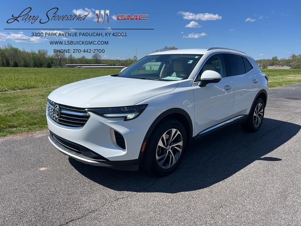 2023 Buick Envision Essence in Summit White — front three-quarter view